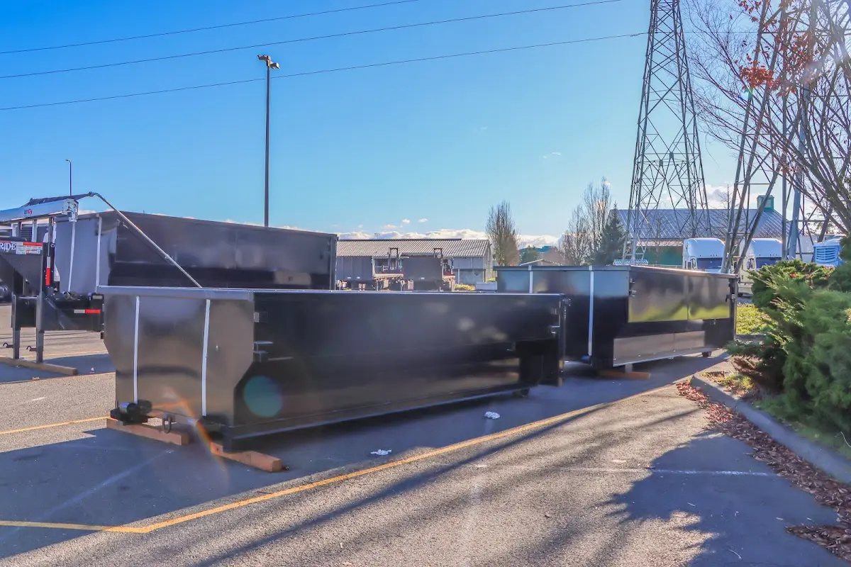 Roll-off dumpster ready for waste disposal at job site for Construction Dumpster Rental in Brookline